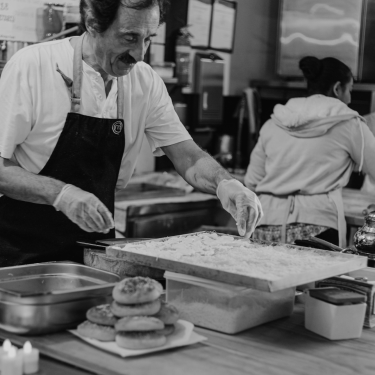A chef preparing fries